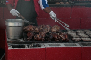 Turkey legs and burgers are on the grill for hungry fairgoers. Staff photo Blanca Reyes